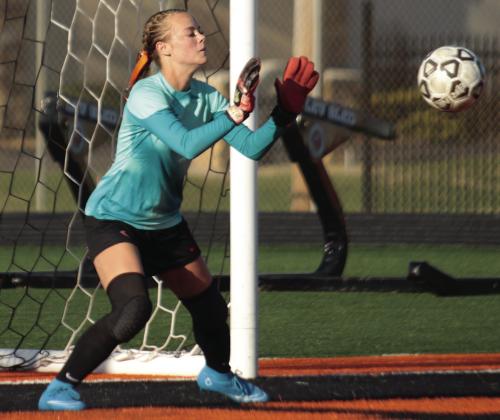 Cushing Lady Tiger goalie Cora Eyeler makes one of eight saves in the Lady Tigers’ match against Ft. Gibson last week. Photos by J.D. Meisner