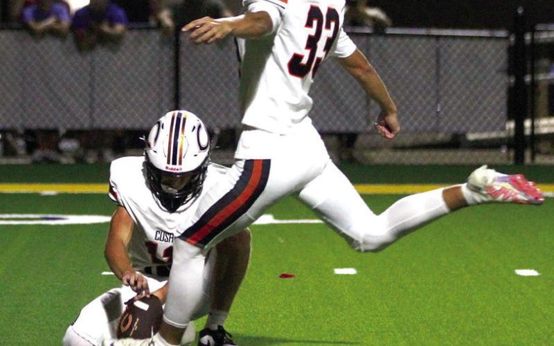 Landon Miller blasts an extra point.