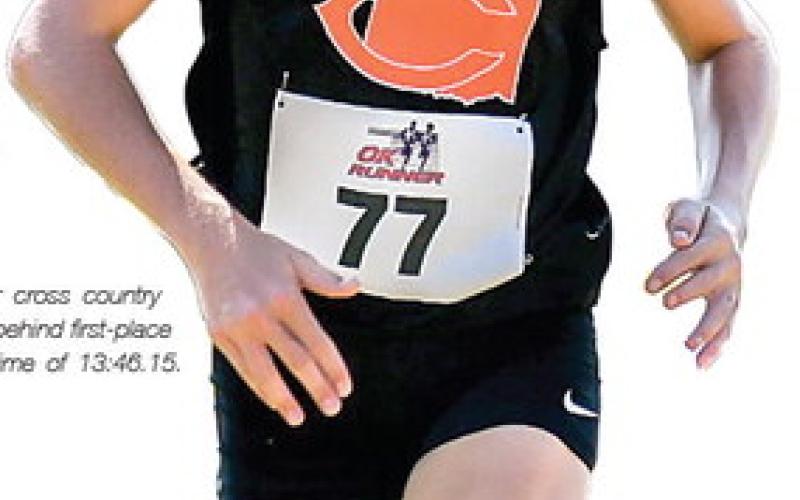 Right: Tiger Freshman Harli York finished fifth at the Meeker cross country meet this past weekend with a time of 14:07.73, 23 seconds behind first-place finisher Raegin Sanders, of Cleveland, who finished with a time of 13:46.15. Photo by Sarah Townes