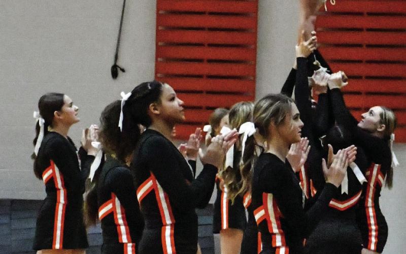 The Cushing Tiger Cheerleaders keep the spirit alive during the Tiger boys vs Cleveland Friday. Photo by Sarah Townes