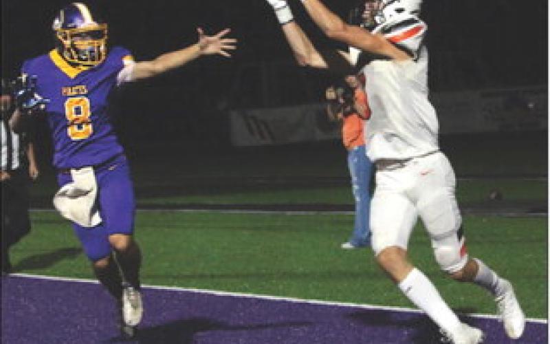 Wide receiver Max Wood makes a catch in the endzone.
