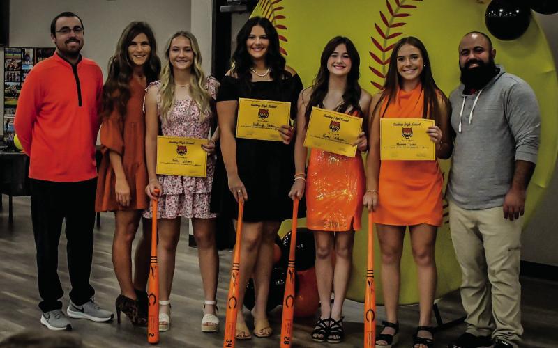 Lady Tiger seniors were presented personalised bats and certificates at the banquet. Pictured are assistant coach Jeff Wintz, head coach Nikki York, senior athletes Kinsley Williams, Hadleigh Stukey, Romy Withiam and Melanie Townes, and assistant coach Josh Encinas