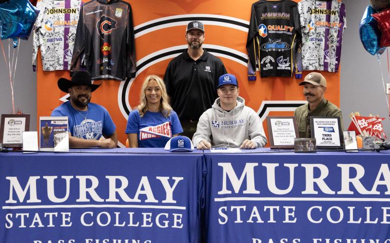 Present for Johnson’s ceremonial signing were, seated, from left, Richard Chavez, Amber Chavez, Cooper Johnson and Jon Johnson. Standing, John Owen, Murray State Fishing Coach. Photo by Leslie Reese Photography
