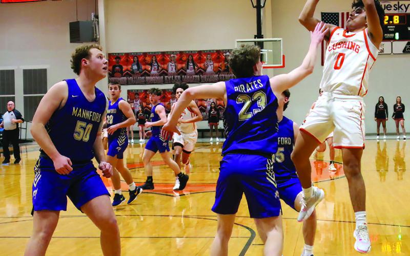 Koda Chavez drops back and shoots from mid range.