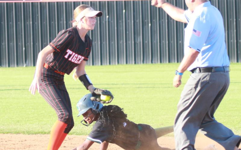 “Swiper, no swiping!” Lady Tiger shortstop Harli York gets the tag at second. Photo by J. D. Meisner