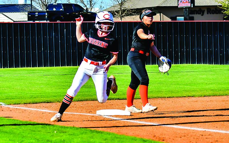 Maya Bridgeman holds at third base after any Tiger Romy Withiam singles. Photo by Sarah Townes