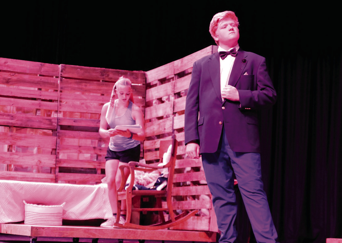Juniors Macie Townes and Kyson Meador share the stage during a rehearsal of the one-act play “The Miraculous Journey of Edward Tulane”. Townes was playing the part of Abilene Tulane, the adoring young girl who was first gifted the title character Edward Tulane — a china rabbit voiced by Meador.