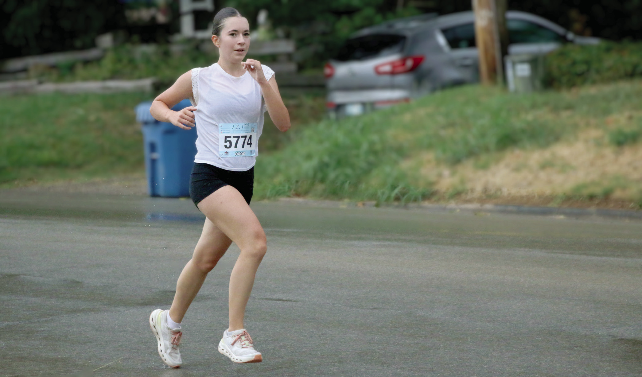 “Running in the Rain” Lea David, senior Lady Tiger and exchange student from France, runs through the rain during the Grappler’s Gallop at the Festival in the Park Saturday, Sept. 26. Photo by Allie Prater. See inside for more festival in the park coverage.