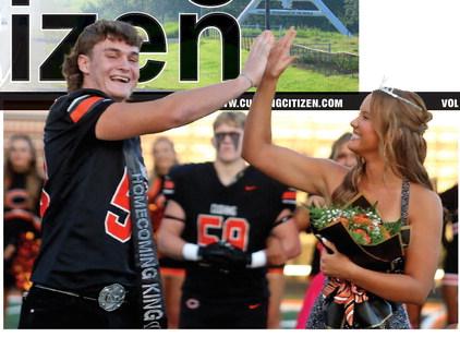 Freshly crowned Homecoming King Justice Elliott and Queen Brinlee Bickell exchange a high-five moments after assuming the throne Friday at O’Dell Field. Early reports indicate the transfer of power was mostly peaceful unless you ask the Miami Wardogs, who went home with their tails tucked after a 42-13 loss. Photo by J. D. Meisner