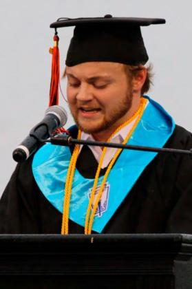 Valedictorian Jonathan Huseman delivers his address, telling his fellow students that to get ahead in life they need to work both smarter, and harder.