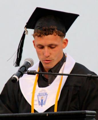 Valedictorian Keaton Crooks delivers his address, paying tribute to his parents for his success.