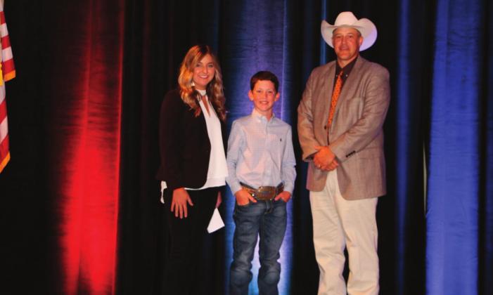 Outgoing OJCA President, Sarah Armitage (left) and Mike Weeks, OCA President (right) pictured with Kelton Arthur, 2020 OJCA All-Around Junior Cattleman of the Year.