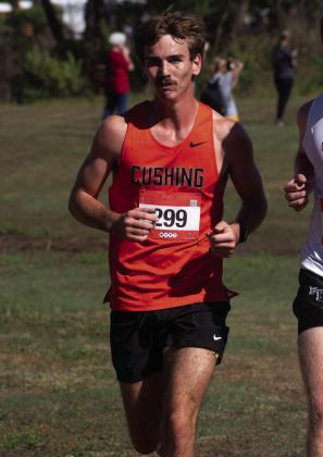 Kamden Evans runs at the Stroud meet. Photo by Sarah Townes