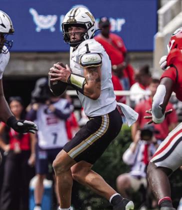 Blaze Berlowitz drops back for a pass versus the Georgia Bulldogs.