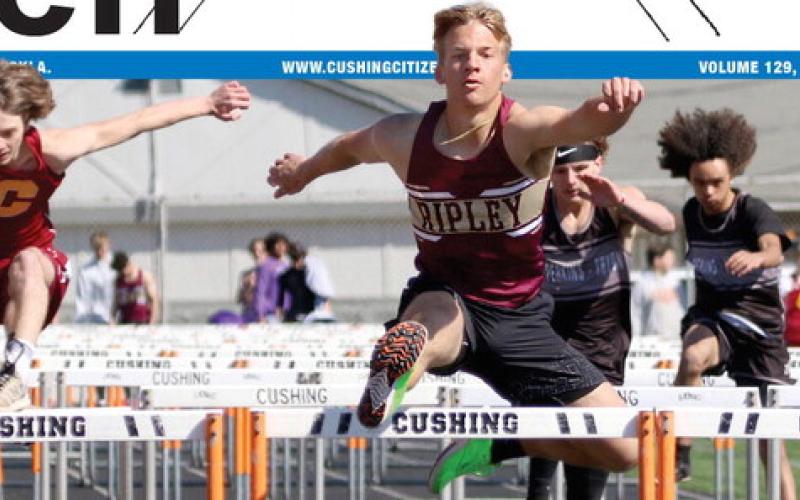 Ripley Warrior senior Mark Lunsford jumps over the last hurdle in the boys 800m hurdles at the Cushing Crossroads relay, Thursday, March 28. Photo by Allie Prater.