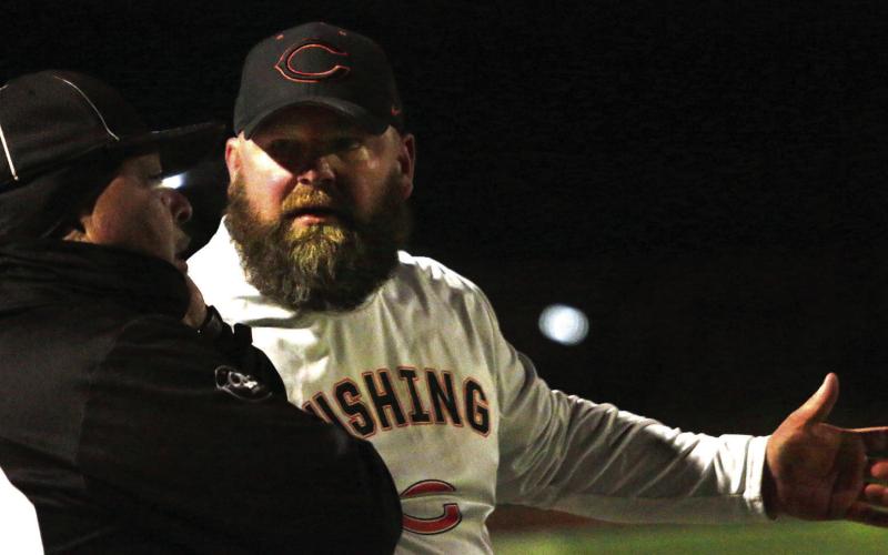 Blaze Berlowitz throws a strike to Brady Matheson during the Tigers’ second-round victory over theBlanchard Lions. Tiger Head Coach Rusty Morgan explains the finer points of game rules to an official as they apply to blocked punts.