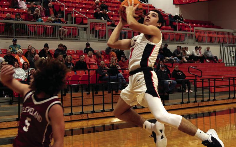 Kanaan Guerrero makes a transition layup. Photo by J.D. Meisner.
