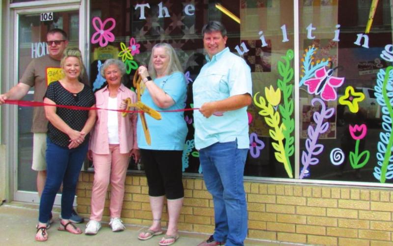 From left: Downtown Cushing Revitalization Association President Justin Cargill, Cushing Chamber of Commerce President/CEO Tracy Caulfi eld, DCRA member Marilyn Duff, Owner Debra Shiplett and Cushing Economic Development Director Bruce Johnson came out on July 20 for a ribbon cutting ceremony at The Quilting Hut located at 106 North Harrison.