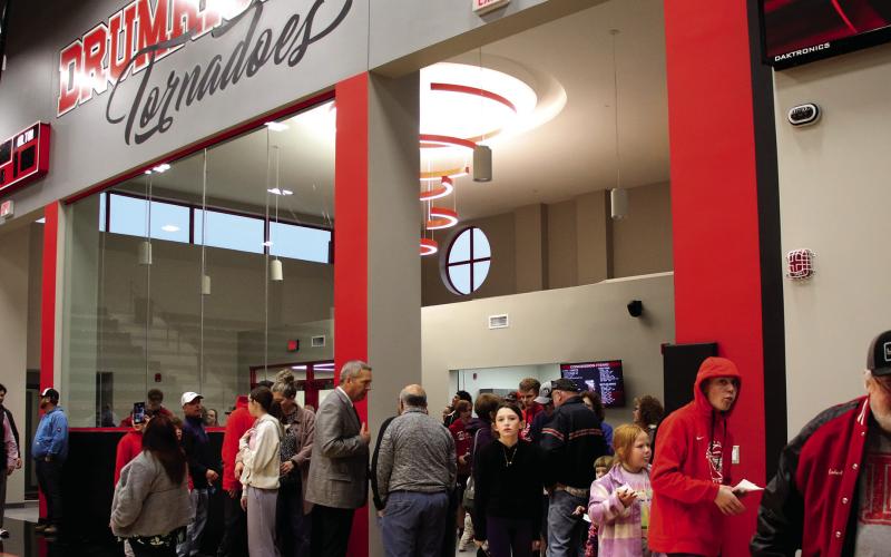 The crowd trickles into the new Activity Center for a tour.