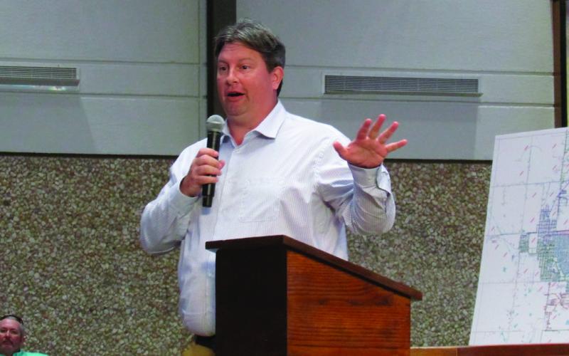 Bruce Johnson explains the issues with finding a location in Cushing for the proposed Southern Rock Energy refinery. Photo by DeAnna Maddox