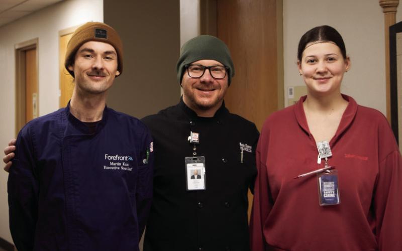Chef Rocky Dunnam, Director of Food and Nutrition Services, with his team; (Right) Martin Kane, Executive Sous Chef, and (Left) Jorja Parks, Catering Supervisor.