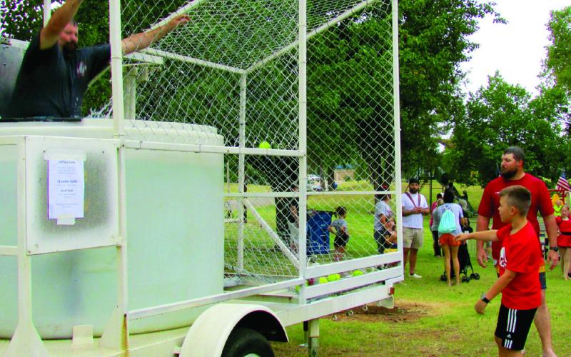 The dunk tank set up by the Firefighter Association made a big splash during Festival in the Park on Sept. 24, especially when Agra Fire Department Chief Mike Callanan took a dip.
