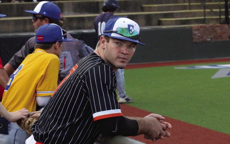 Riley Matheson looks onto the field as he awaits the commencement of the 2023 Oklahoma Baseball Coaches Association All-State game. Matheson finished the game going 1-1 with a single and an RBI and entered the game at catcher in the fifth inning.