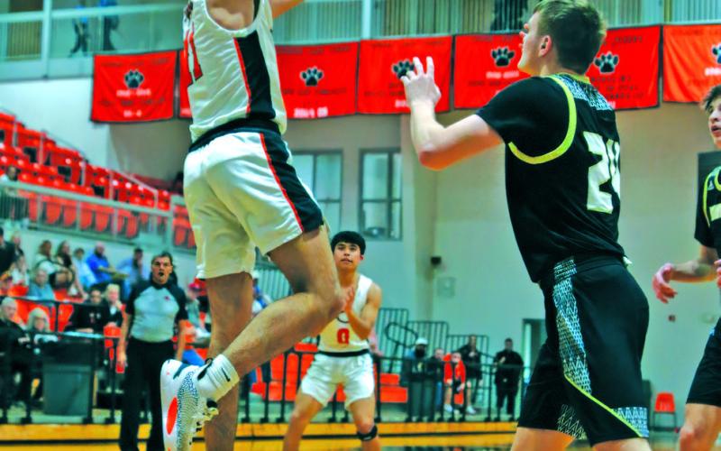 Kanaan Guerrero goes up for a short range floater.