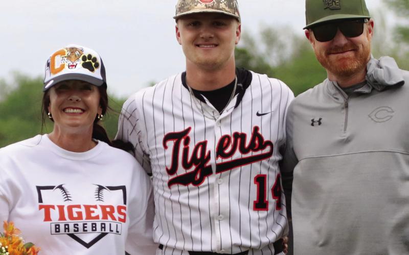 Statler Ethridge escorted by parents Brad and Amy Ethridge. Photos by Allie Prater