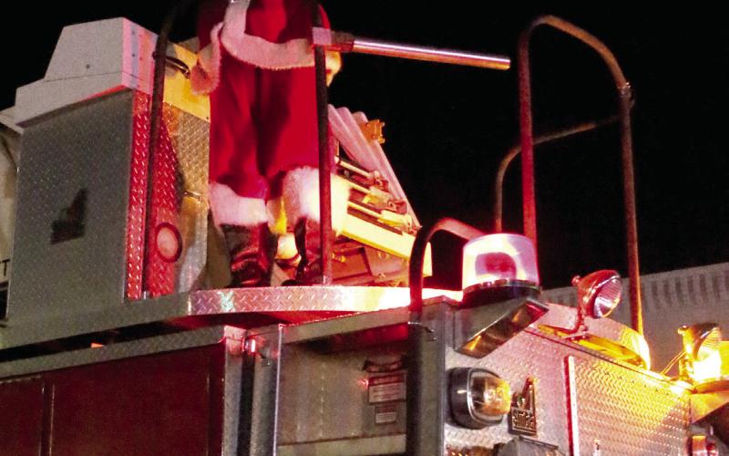 Santa Claus wishes a merry Christmas to all, and to all a goodnight, to close out the 2024 Parade.