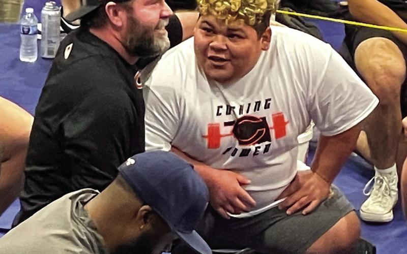 Flores breaks state record at powerlifting meet