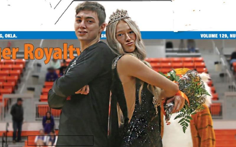 Cushing Highschool Basketball 2024 Homecoming King Johnny Hilligoss and Queen Kaitlynn Callanan strike a pose after after the coronation ceremony held Friday, Jan. 26. Photo by Amber Fausto.