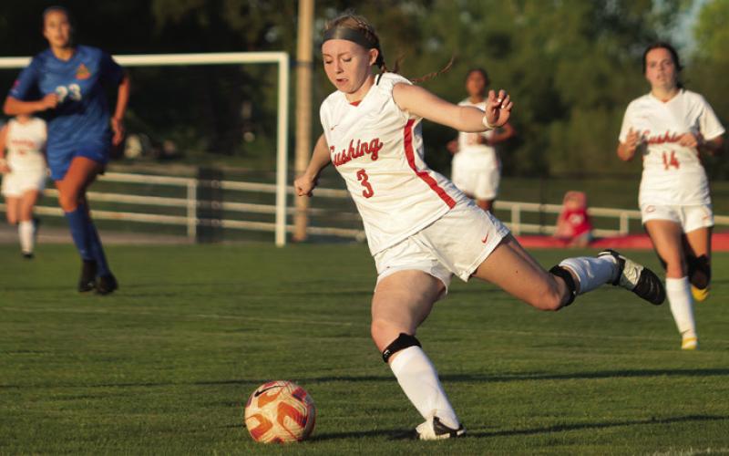 Cushing Lady Tiger Whitney Wood strikes the ball towards the net during the 2023 OSSAA class 4A soccer playoffs vs Oklahoma Christian School in Edmond.