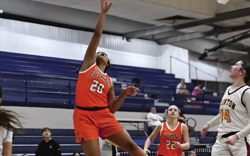 Cushing’s Mariah Shanklin makes a layup in transition during the Lady Tigers’ regional tournament opener against Clinton last Thursday. Cushing lost in a heartbreaker, 29-32, ending their season.