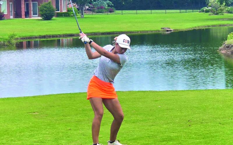 Cushing Lady Tiger Senior Katelynn Powell drives to the green during the OSSAA Class 4A Girls State Golf Tournament in Shawnee.