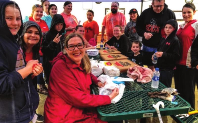 Volunteers were fed pizza prior to braving the elements for.