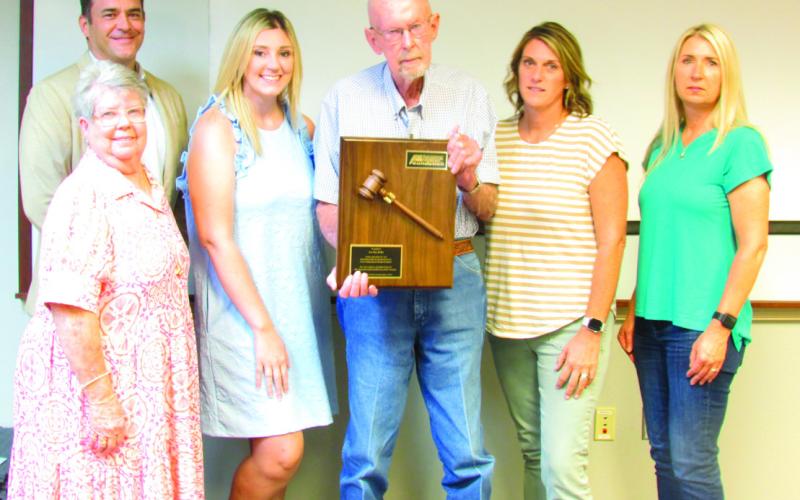 Pictured are Cushing Regional Hospital Foundation members Matt Turner, Pam Hawthorne, Ashley Baker, Ashley Joyner, and Amy Baxter surrounding recently retired foundation president Lee Roy Kalka during a recognition ceremony hosted by the Foundation at Cushing Hillcrest Hospital. Photo by DeAnna Maddox.