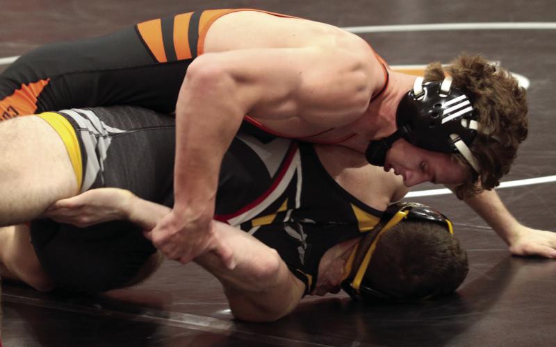 CHS Wrestler Kaiser Simpson had a good night, defeating his opponent by technical fall and being named homecoming king, 2023. Photo by J.D. Meisner.