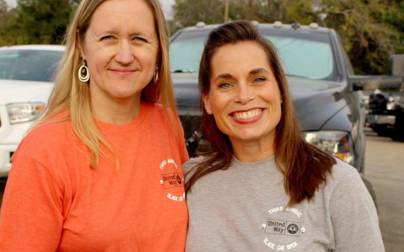 Latina Simmons, left, is pictured with Ruth Cavins, United Way of Payne County executive director, at a past years’ Black Cat Golf Tournament in Cushing, OK.