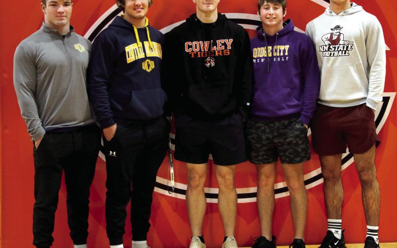 Five Cushing Tiger seniors signed to play sports at the next level last week. Riley Matheson and Brody Berlowitz will play baseball for UCO; Jacob Horn signed to play baseball for Cowley County College; Kolby Legg will play golf at Dodge City Community College and Blaze Berlowitz signed to play D1 football at New Mexico State University. Photo by Allie Prater.