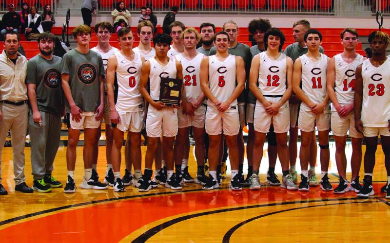 The Cushing Tigers keelhauled the Bristow Pirates 74-50 Friday to claim the district championship and advance to the regional brackets. They play Oklahoma Christian School Thursday, 7:30 p.m., at Oklahoma Christian. Photo by J.D. Meisner