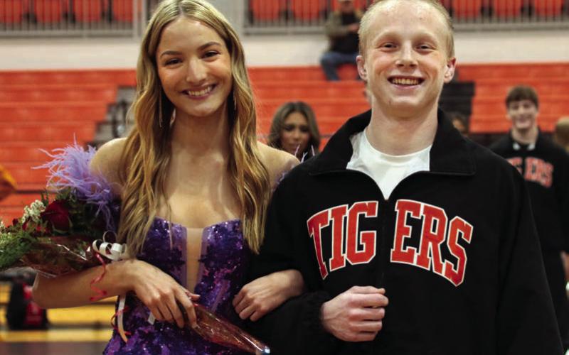 Kyle Sams escorts Jade Morgan.