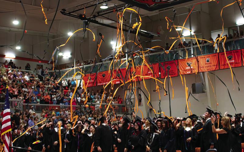 The Cushing High School Class of 2025 celebrate at the closing of Friday night’s graduation commencement ceremonies. Photo by J. D. Meisner