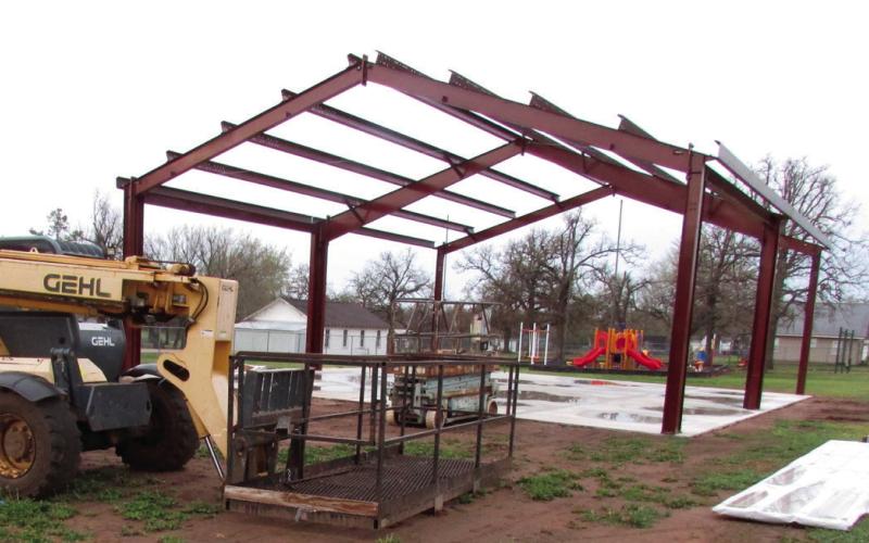 Last Thursday on March 21 material for the new Bearcat den roof sat out before being installed later in the day. Photo by DeAnna Maddox The playground area is open to the public when school is not in session and Kelly said it is a popular place for local families to come.