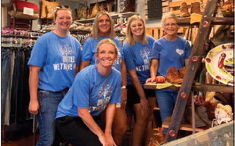 A team of employees from 25/8 Safety volunteer on Day of Caring