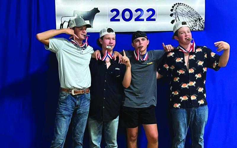 Pictured are the Cushing FFA members who took home first place in the Farmhand Olympics during the Payne County Fair held last week from Aug. 22 to Aug. 27— Khyler Simon, Clay McKiddy, Kale Robinson and Korben Gaskins