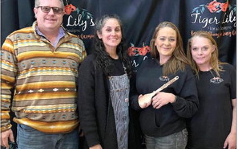 DCRA President Justin Cargill stands with the winners of “Best Theme”, Lindsay Overfelt, Jennifer Hixson, and Kristy Barnes, from Tiger Lily’s Floral, during the DCRA Soup Thyme competition Friday, March 3.