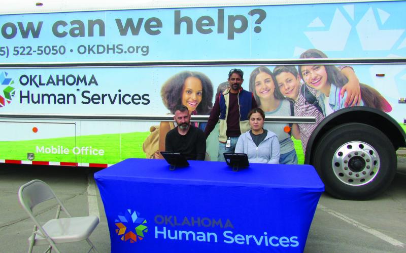 Family Services Specialists Howard Smith, Naveen Nair, and Yesenia Ramirez wait for clients in the parking lot of the Cushing Senior Citizen Center last Wednesday on April 24. The group will be offering OKDHS assistance to local clients the fourth Wednesday of every month from 9 a.m. to 4 p.m. Photo by DeAnna Maddox