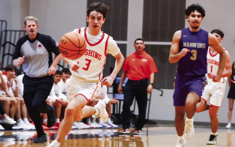 Curtis Parmley takes advantage of a transition opportunity against the Mannford Pirates. Photo by Sylvia Daniel
