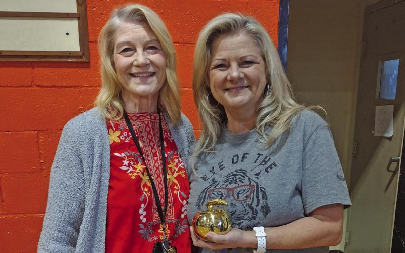 Agra Public School’s third grade teacher Vickie Weigel was announced as the 2025 District Teacher of the Year during the monthly assembly held on Monday, May 5. Pictured is Superintendent Dr. Anita Watkins with Weigel holding the golden apple she was presented with. Watkins explained Weigel was selected by her peers to receive the recognition. Photo by DeAnna Maddox